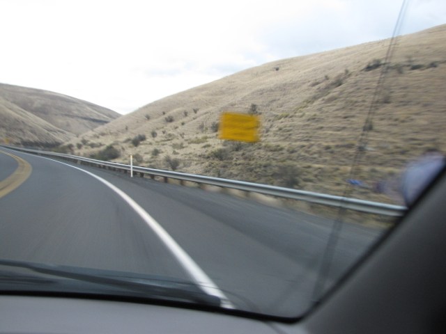 Da long downgrade; runaway truck ramp: 3 miles